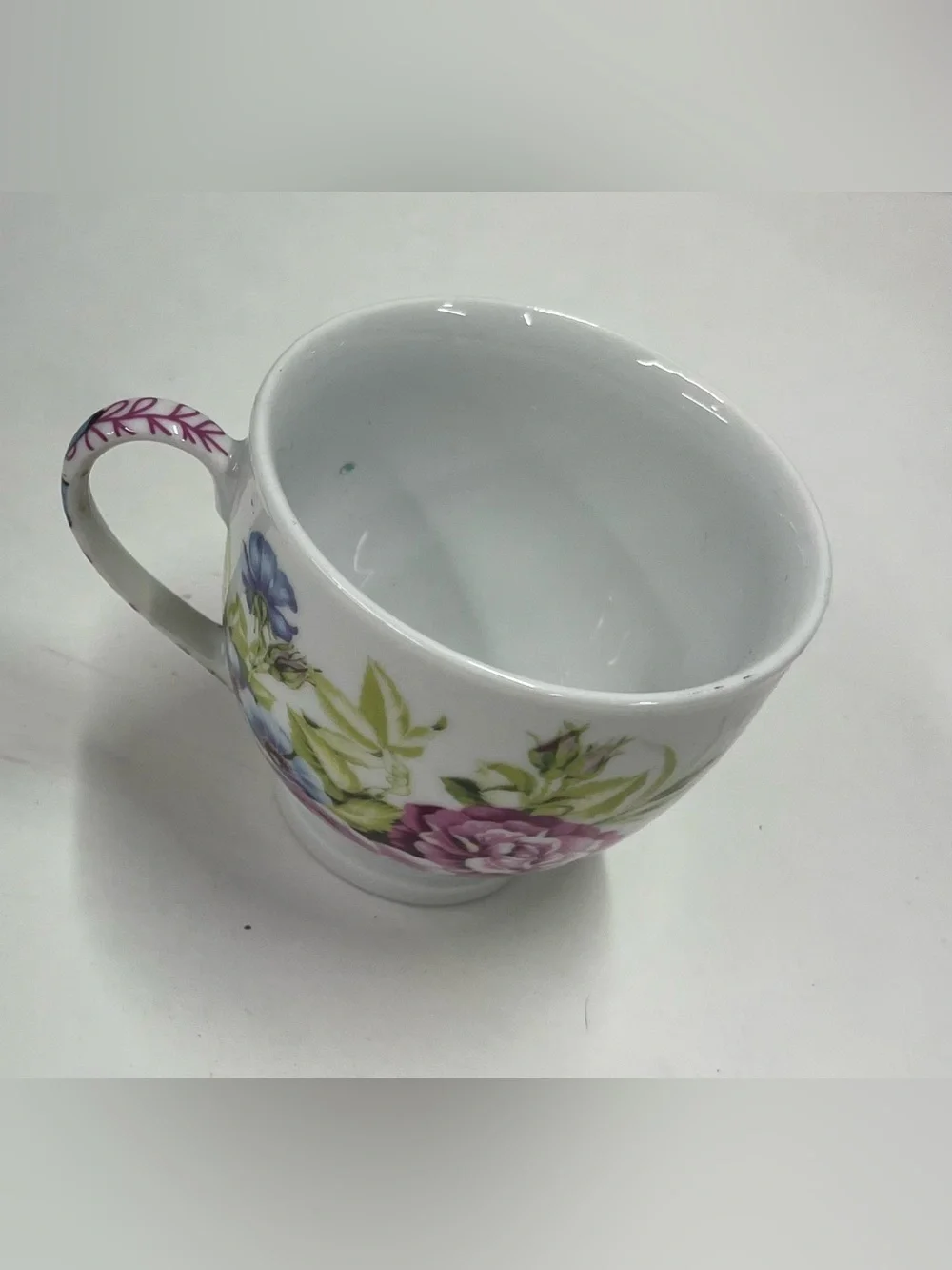 Ceramic teacup and saucer